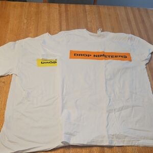 White T-Shirt with Orange and Yellow Accents